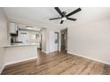 Open-concept living area featuring modern finishes and ample natural light at 1148 Rosemary St, Denver, CO 80220