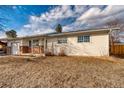 Full view of the house exterior, showcasing its design and landscaping at 13643 E Exposition Ave, Aurora, CO 80012