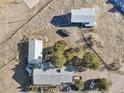 Overhead view showcasing the house and surrounding land at 9042 E Wagon Wheel Way, Parker, CO 80138