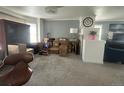 Living room with boxes stacked in it at 4824 S Eaton Park Way, Aurora, CO 80016