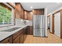 Well-equipped kitchen featuring stainless steel appliances, granite countertops, and ample storage space at 375 Castlewood Dr, Evergreen, CO 80439