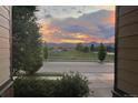 Beautiful morning shot of the community street, with distant mountains, trees and sunrise sky views at 3572 Lissa Dr, Berthoud, CO 80513