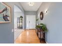 Bright entryway features hardwood floors and stylish accents, creating a warm welcome at 4515 W 107Th Cir, Westminster, CO 80031