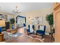 Elegant living room showcasing stylish decor, hardwood floors, and a cozy fireplace at 2271 Holly St, Denver, CO 80207