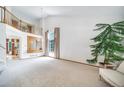 Bright living room with high ceilings and ample natural light at 20738 E Grand Pl, Aurora, CO 80015