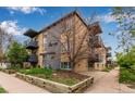 Apartment building exterior showcasing updated brick and gray facade at 200 N Sherman St # 7, Denver, CO 80203