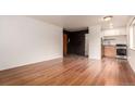 Bright living room featuring hardwood floors and neutral walls at 200 N Sherman St # 7, Denver, CO 80203