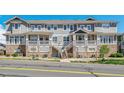 Inviting townhouse with stone accents and a private entrance at 9351 Amison Cir # 104, Parker, CO 80134