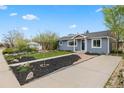 Inviting single Gathering home featuring a well maintained landscaped front yard at 835 S Shoshone St, Denver, CO 80223