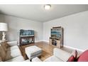 Bright living room featuring hardwood floors and modern furniture at 55 Emerald St, Broomfield, CO 80020