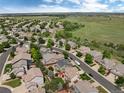 Areal view of a peaceful neighborhood with lush greenery and spacious homes at 10245 Nottingham Dr, Parker, CO 80134