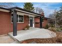 Inviting front porch featuring a covered entryway and classic architectural details at 5743 Field St, Arvada, CO 80002
