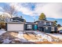 Beautiful two-story home with updated exterior paint and landscaping at 4967 S Urban Ct, Morrison, CO 80465