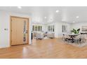 Bright open-concept living space with hardwood floors and abundant natural light at 3775 S Forest Way, Denver, CO 80237