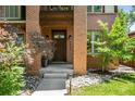 Inviting front entrance with brick pillars and landscaped surroundings at 1934 S Sherman St, Denver, CO 80210