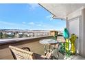 Relaxing balcony seating area offers clear views of the area, enhanced by unique cactus decorations at 920 E Plum Creek Pkwy # 306, Castle Rock, CO 80104