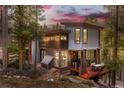 Unique contemporary home with mixed materials and deck in wooded setting at 167 Independence Cir, Breckenridge, CO 80424