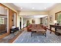 Cozy living room featuring an area rug, wood floors, and natural light at 167 Independence Cir, Breckenridge, CO 80424