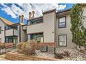 Exterior view of the building featuring siding and the front facade at 11913 E Harvard Ave # 106, Aurora, CO 80014