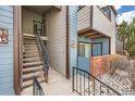 Exterior of the building featuring siding and the entrance at 11913 E Harvard Ave # 106, Aurora, CO 80014