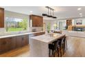 Spacious kitchen, island seating, and views of backyard at 2512 Premier Pl, Boulder, CO 80304