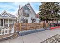 The house shows an attractive fence and updated exterior at 3339 Tejon St, Denver, CO 80211