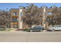 Contemporary brick building with stylish exterior and parking at 701 E 24Th Ave, Denver, CO 80205