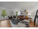 Inviting living room with stylish decor, a comfortable seating area, and abundant natural light at 116 Monarch St, Louisville, CO 80027