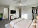 Virtually staged main bedroom with large closet and ensuite bath at 4974 E 124Th Way, Thornton, CO 80241