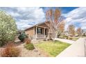 Beautiful home showing lawn, attractive landscaping, covered porch, and pleasant curb appeal at 1358 14Th Ave, Longmont, CO 80501