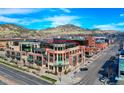 Aerial view of building showcasing rooftop deck and surrounding cityscape at 1077 Canyon Blvd # 403, Boulder, CO 80302