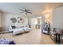 Bright living room featuring hardwood floors, neutral paint, and contemporary furnishings at 4160 E 115Th Pl, Thornton, CO 80233