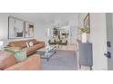 Bright living room with stylish furniture, modern decor, and an open floor plan at 3619 N York St, Denver, CO 80205