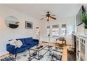This bright living room features hardwood floors, a comfortable couch, and a modern coffee table at 579 S Sherman St, Denver, CO 80209