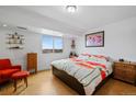 Relaxing bedroom with a king-size bed and cityscape window view at 800 N Washington St # 710, Denver, CO 80203