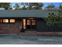 Charming home featuring a stylish front door with decorative glass and stone accents at 21859 Grandview Ave, Golden, CO 80401