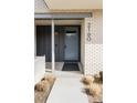 Close-up of modern front door featuring clean lines and updated architectural design at 2160 Folsom St, Boulder, CO 80302