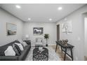 Comfortable living room featuring ample seating and stylish furnishings at 2696 S Grove St, Denver, CO 80219