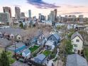 Urban aerial view of Denver homes with skyline backdrop, showcasing a vibrant neighborhood setting at 2244 N Washington St, Denver, CO 80205