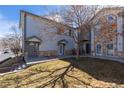 Condo building featuring well-maintained landscaping, offering a glimpse of the property's exterior charm and curb appeal at 3260 E 103Rd Pl # 912, Thornton, CO 80229