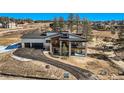 Luxury home with a large backyard and a stunning mountain view at 5820 Powell Rd, Parker, CO 80134