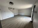 Spacious living room featuring sleek flooring, ample natural light, and neutral tones for versatile decorating at 8047 Wolff St # H, Westminster, CO 80031