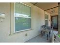 Cozy front porch with seating area, perfect for relaxing and enjoying the neighborhood views at 1211 E 26Th Ave, Denver, CO 80205