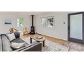 Cozy living room features hardwood floors, a fireplace, and natural light at 1557 North St, Boulder, CO 80304
