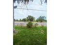 View of park with trees and grassy backyard at 3000 Billings St, Aurora, CO 80011