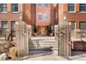 Attractive Swallow Hill entrance with brick and iron detailing at 1631 N Emerson St # 407, Denver, CO 80218