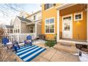 Cozy patio with blue striped rug and comfortable seating at 911 Snowberry St, Longmont, CO 80503