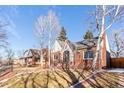Attractive brick house with a landscaped yard at 2068 Jasmine St, Denver, CO 80207