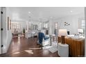 Open living space with hardwood floors and modern furniture at 2068 Jasmine St, Denver, CO 80207