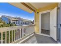 Spacious balcony with a view of the neighborhood, perfect for outdoor relaxation at 9471 Ashbury Cir # 202, Parker, CO 80134